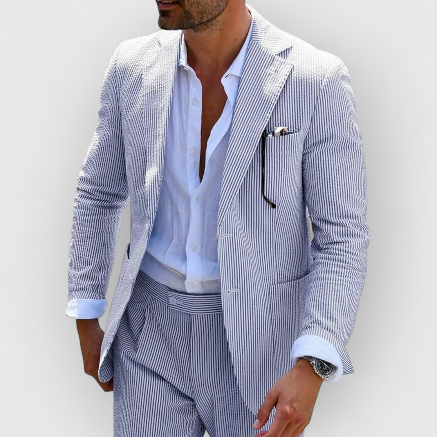 Traje de verano para hombre en rayas de seersucker con chaqueta y pantalones