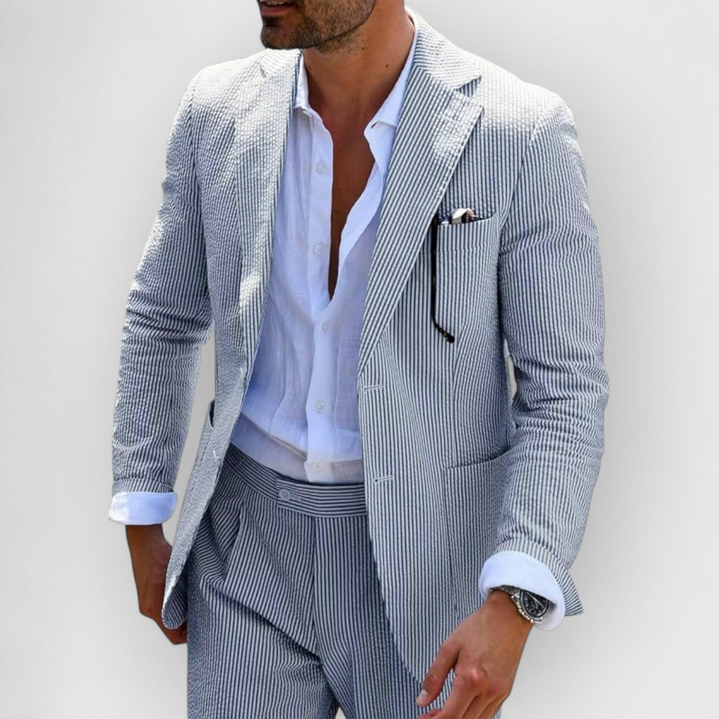 Traje de verano para hombre en rayas de seersucker con chaqueta y pantalones